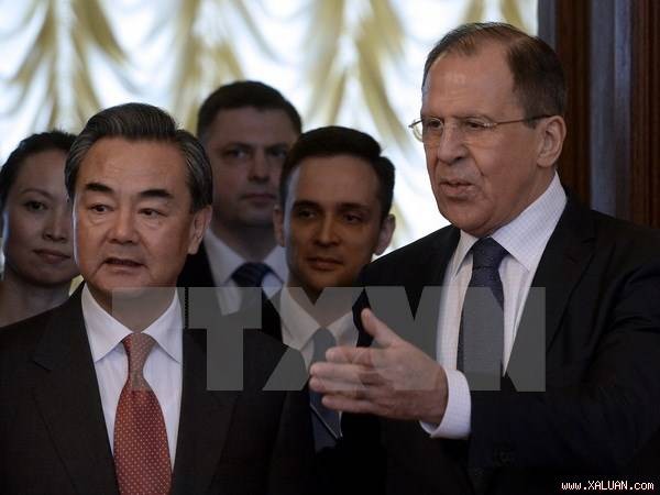 Лавров и Ван И обязались прилагать совместные усилия для разрешения международных проблем - ảnh 1
